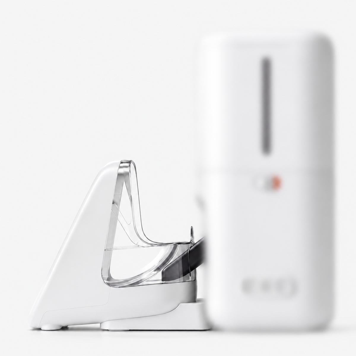 Side view of an ePawDen feeder with an automatic dispenser in the foreground